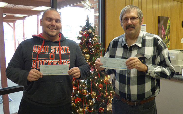 Cop and Kids receives donation from Bryan Eagles